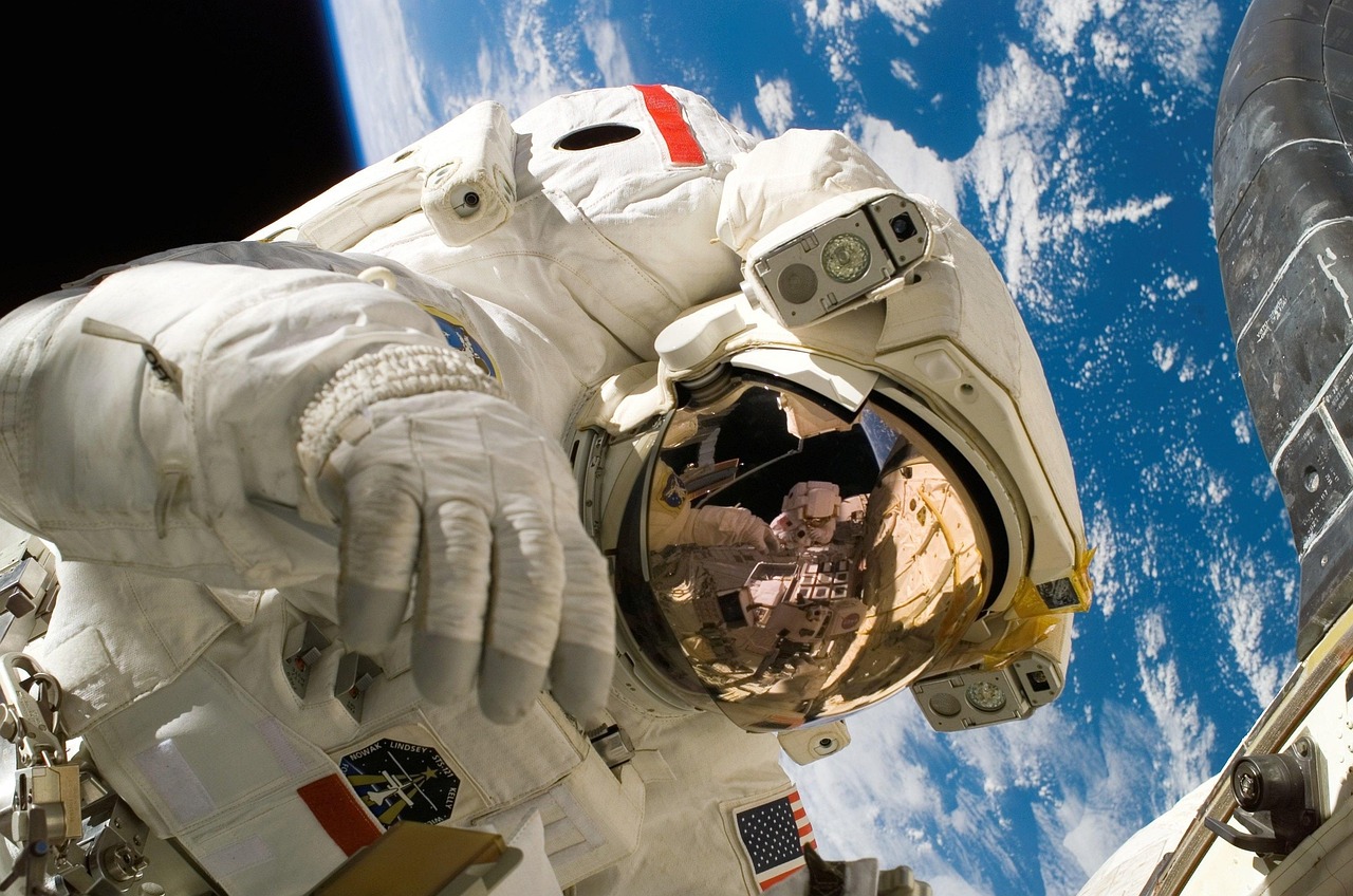 Astronaut Performing Spacewalk with Earth in Background