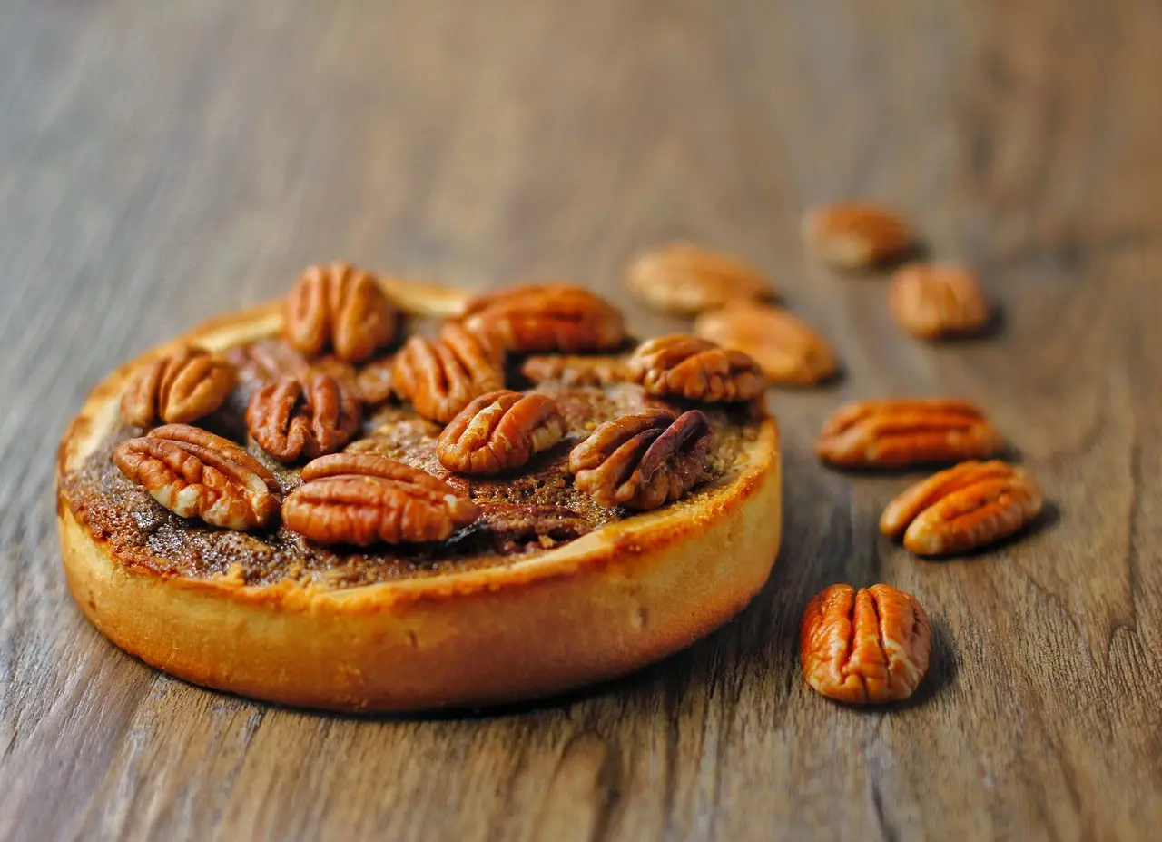 Delicious Pecan Tart on Wooden Surface