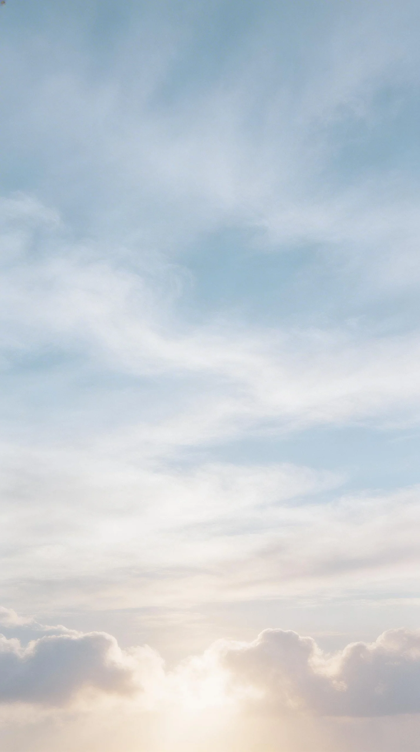 Soft Clouds Brightening a Calm Sky