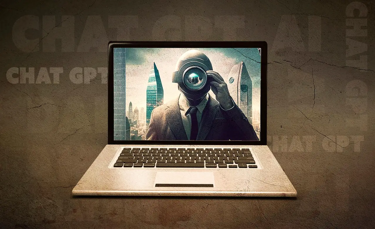 Surreal Laptop Display Featuring a Man with a Camera Lens Head