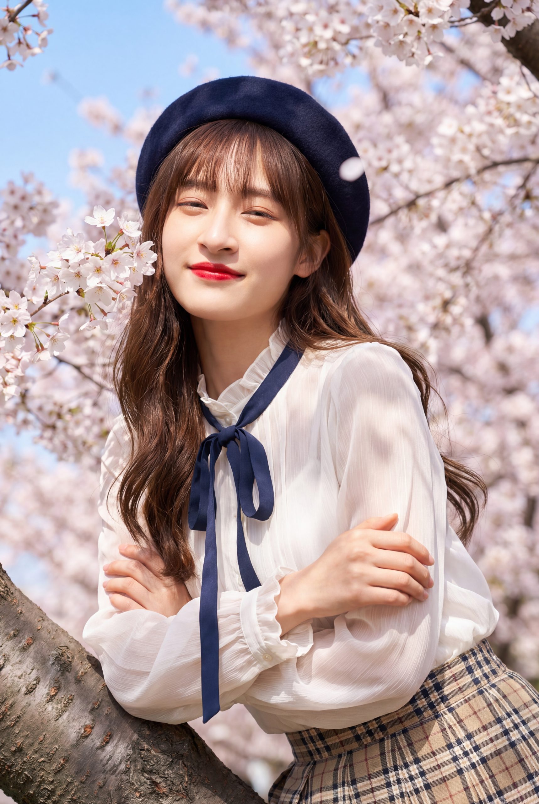 Young Woman in Beret Among Cherry Blossoms