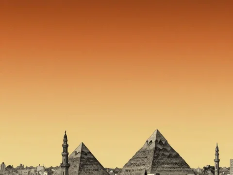 Cairo Cityscape with Pyramids at Sunset