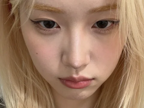 Close-up Portrait of a Young Woman with Blonde Hair