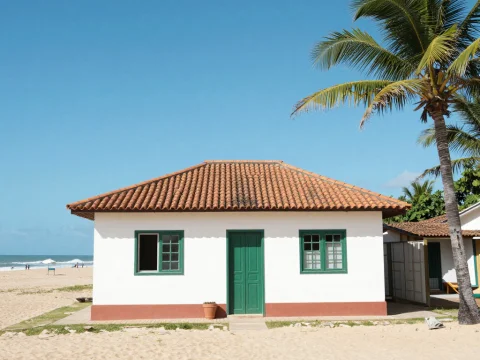 Cozy Beachside House with Tiled Roof and Palm Tree