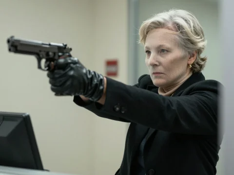 Determined Woman Pointing Gun in Bank Robbery Scene
