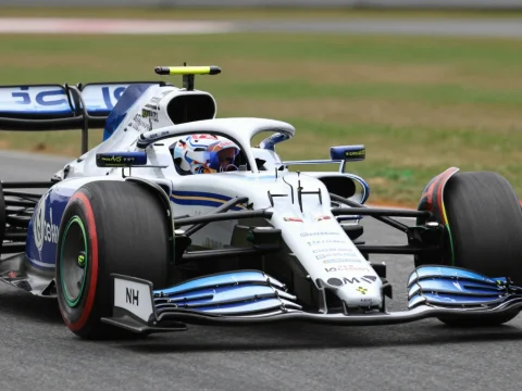 Formula 1 Racing Car on Track in Action