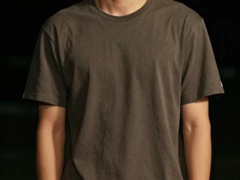 Friendly Young Asian Man Smiling in Casual Outfit