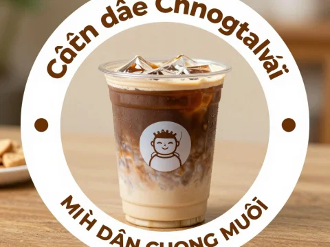 Iced Coffee Drink in Clear Plastic Cup on Wooden Table