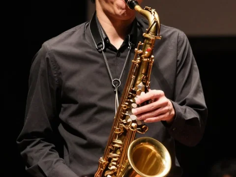 Japanese Saxophonist Performing Live on Stage
