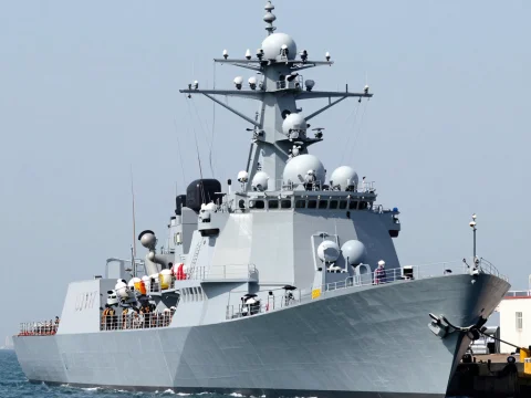 Modern Naval Destroyer Docked at Port