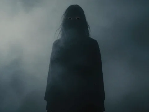 Mysterious Shadowy Figure in Fog