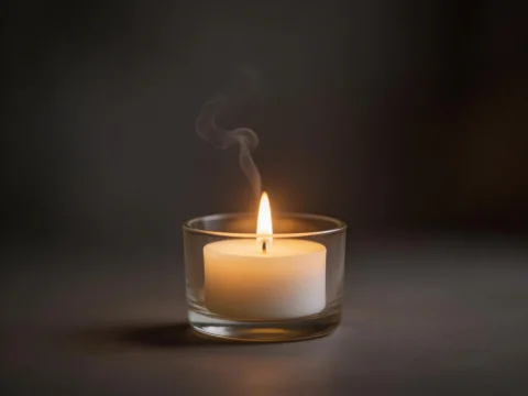Peaceful Candle Flame in Glass Holder
