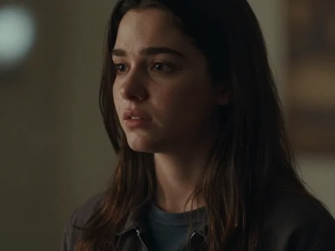 Pensive Young Woman in Dim Light