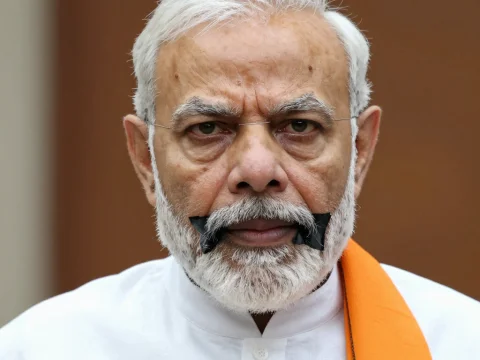 Portrait of a Man with Black Tape on Mouth