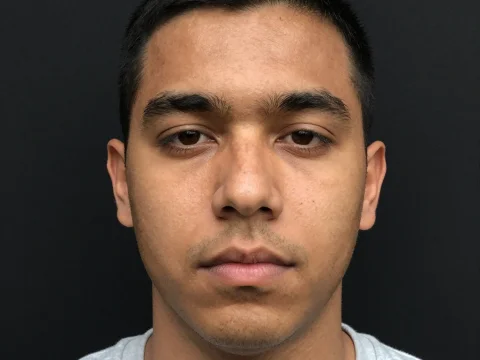 Portrait of a Young Man with Neutral Expression