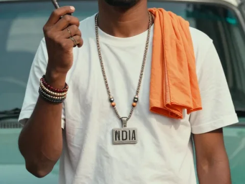 Portrait of Indian Man with Traditional Object and Car