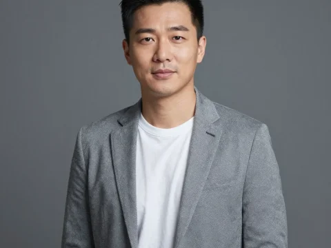 Professional Asian Man in Gray Blazer and White Shirt