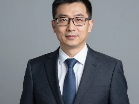 Professional Middle-Aged Businessman in Suit and Tie