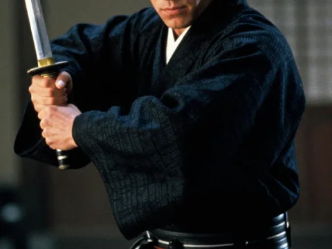 Samurai Warrior in Traditional Black Kimono with Sword