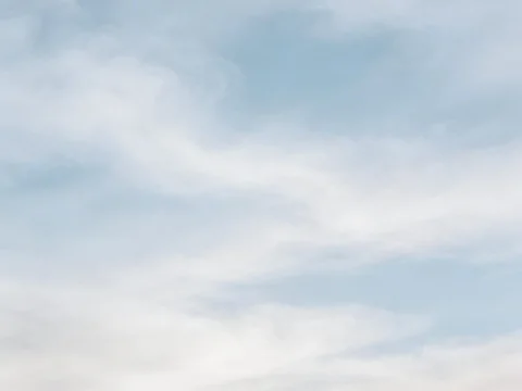 Soft Clouds Brightening a Calm Sky