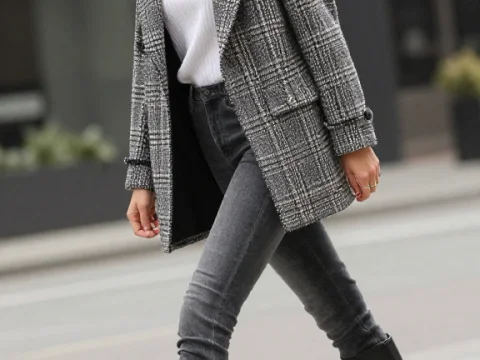 Stylish Woman Walking in Urban Outfit with Plaid Coat and Boots