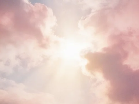 Sunlight Breaking Through Soft Pink Clouds