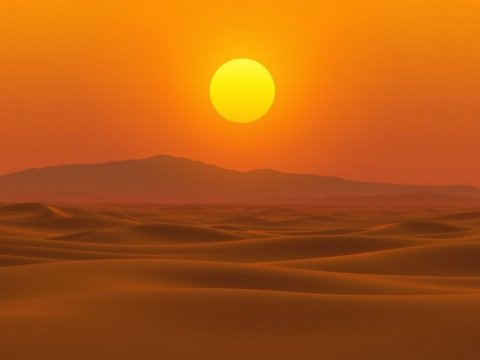Sunset Over Rolling Desert Dunes