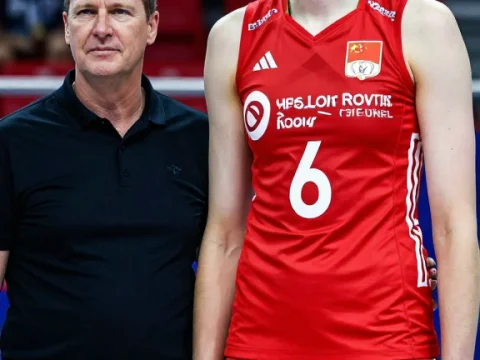 Tall Female Volleyball Player with Coach in Arena