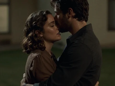 Tender Moment Between a Couple Embracing at Night