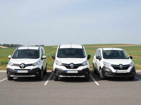 Three White Renault Models Parked Side by Side