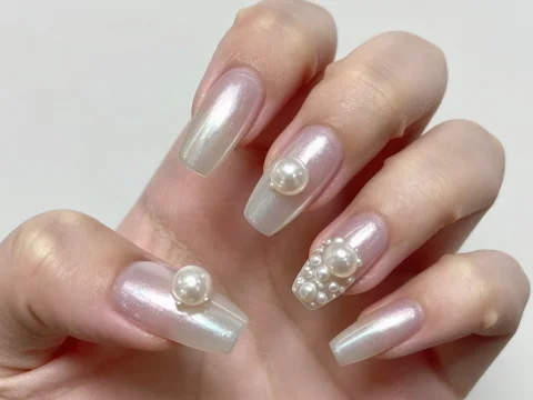 Ultra Realistic Pearl Nail Art with Shimmer Finish
