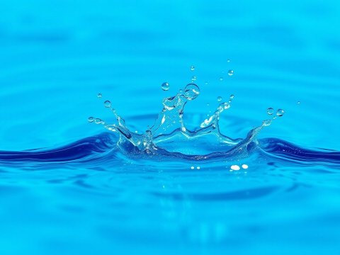 Vibrant Blue Water Splash in Motion