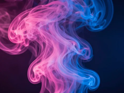 Vibrant Pink and Blue Smoke Swirls on Dark Background
