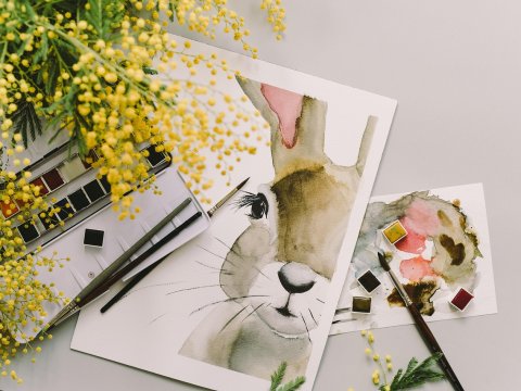 Watercolor Painting of a Rabbit with Art Supplies
