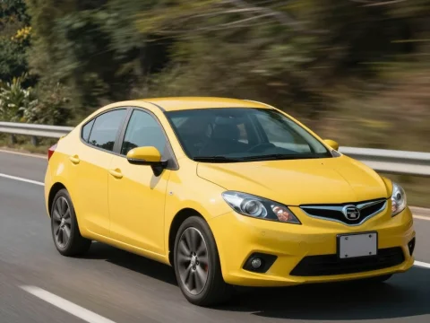 Yellow Sedan Driving on Highway